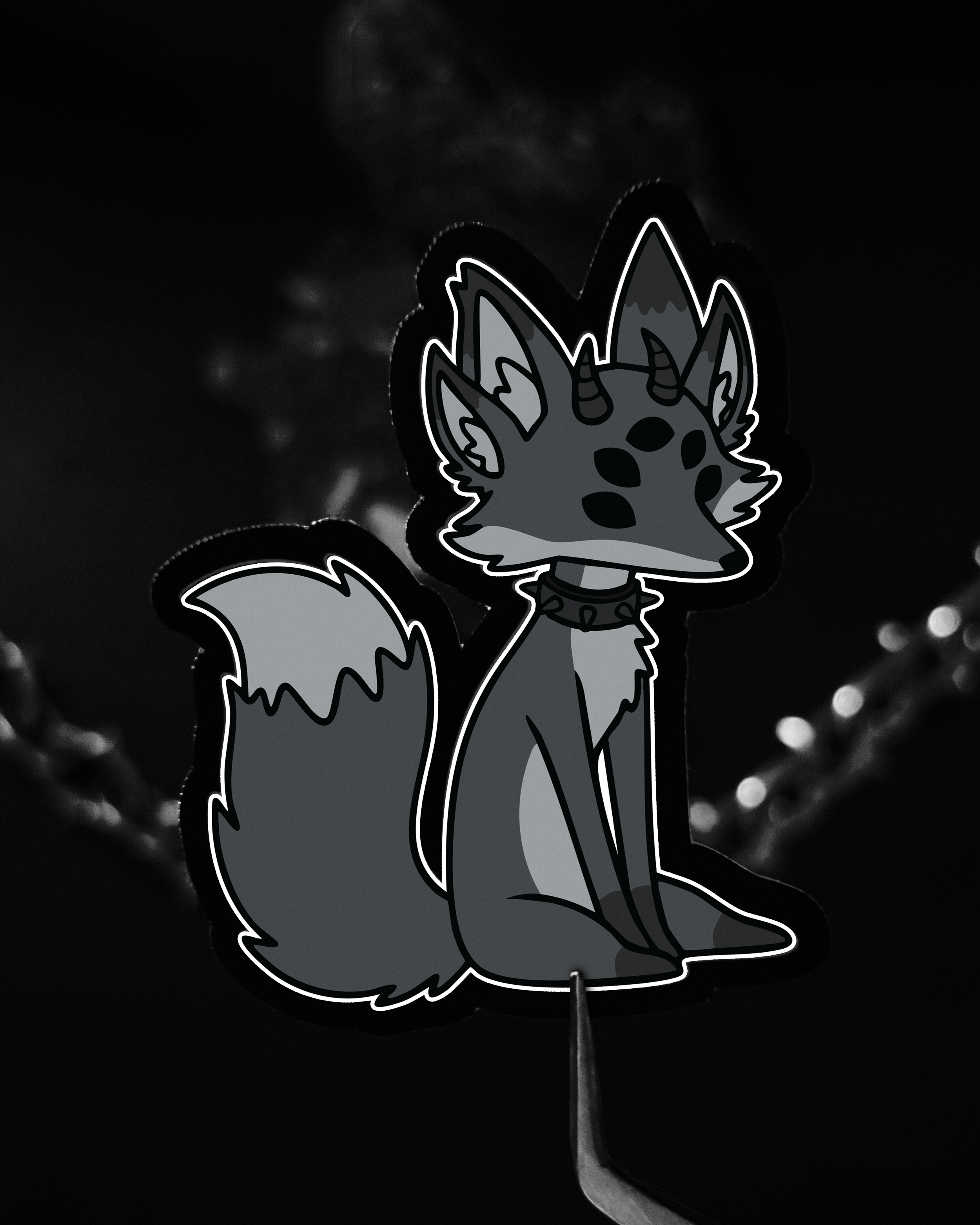 Sad lanky demon fox creature vinyl sticker with black horns, 4 ears, edgy, spiked choker, dark cute style, sitting pose