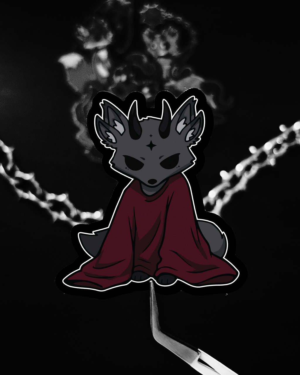 Sad demon fox creature vinyl sticker with black horns, 4 ears, wearing oversized baggy shirt, moody, dark cute style